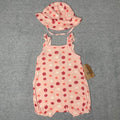Pink Chick Pea baby romper and matching sun hat with seashell and starfish print
